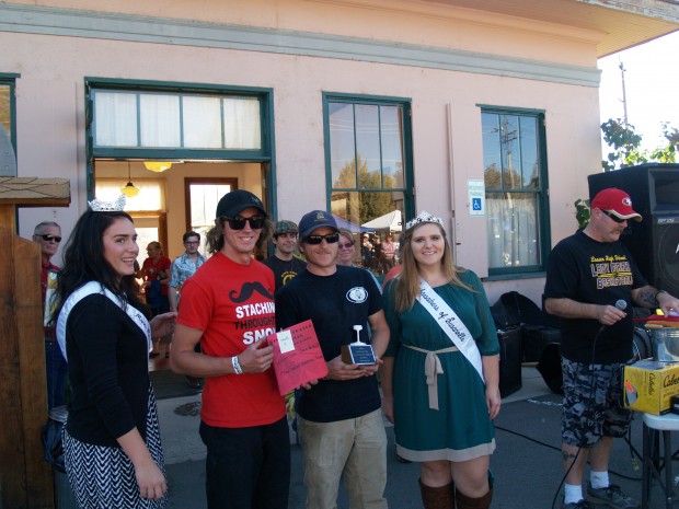 Lassen Hot Shots taking 1st in Handcar Race with Miss Lassen County, Heather Fortin, and Ambassadress, Cheyenne Osborn