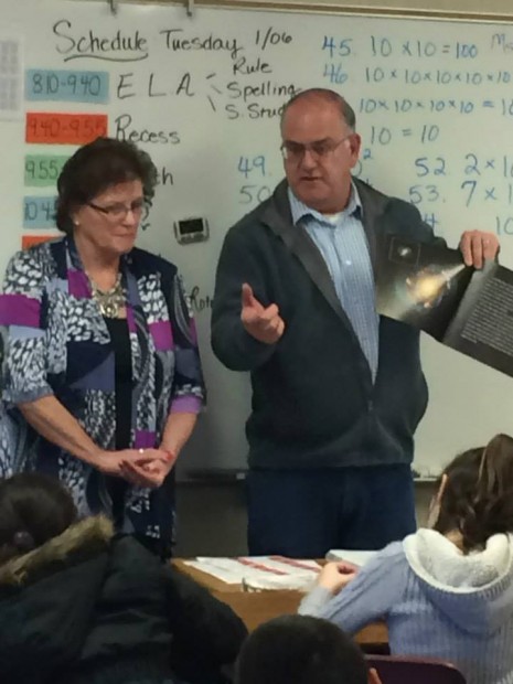 Penny Artz and Jim Chapman talk about the solar system with Ms. Cooper's class.