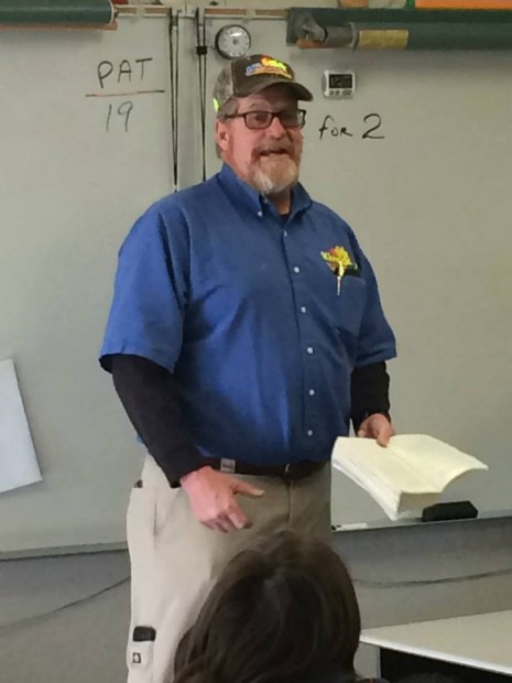 Wade Workman reads to Mr. Marten's class.